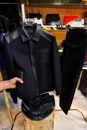 The Peak of Florentine Luxury: Ferragamo Black Pointed-Collar Wool & Leather Jacket